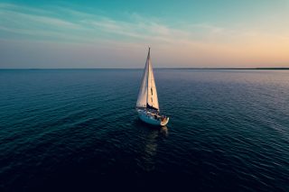 Sailboat Drone photo of a sailboat in a lake Z.A. Studios