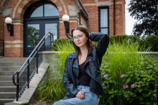 Portrait Handeld photo of girl sitting Z.A. Studios